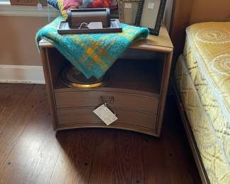 Mid-Century Modern bedside table with two drawers and storage shelf, made by The Johnston Furniture Co. Grand Rapids, Mich. and designed by Paul Frankl. We have to of the pieces