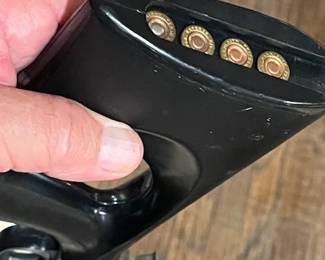 It holds 4 shells in the butt of the stock.