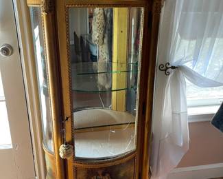 French Victorian Vernis Martin gilt curio cabinet with curved glass, mirrored back, and scenic panels at the base. 54 1/2" high, 27" wide 13" deep