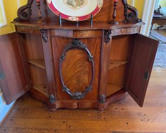 Antique burlwood credenza with solid burl contoured 24 1/2" back with carved Rosewood framing and ornamentation at top. 54 1/2" x 14 1/2" x 36" high.