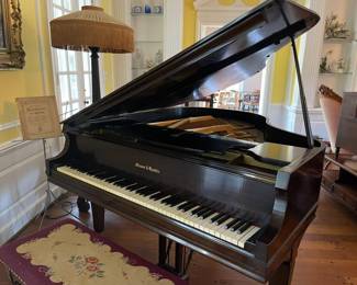 This beautiful Mason & Hamlin Baby Grand Piano is located on the back wall of the parlor.