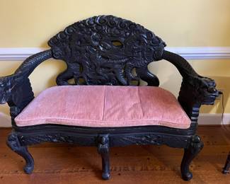 Antique Japanese teakwood sofa with pink velvet upholstered cushion. Original to the house