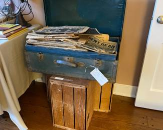 Old metal trunk, lots of great historical newspapers and vintage fruit crates