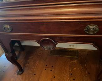 Showing the lower detail of the china cabinet