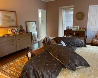 Looking across the bedroom, beautiful king quilt with shams