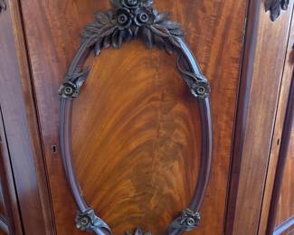 Side panel of the burlwood credenza