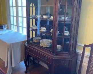 Mahogany china cabinet with dome top, one drawer, 4 shelves and two small cupboards on either side of the drawer. 49" x 74" x 17 1/2"