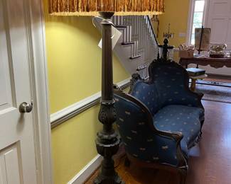 Victorian mahogany floor lamp, heavily carved with original shade