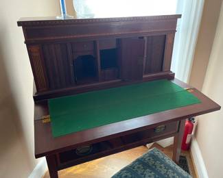 Mahogany Hepplewhite desk with tambour doors and the folding writing surface opened