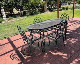 Vintage iron garden table with four chairs