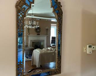 Antique beveled mirror bordered with blue glass and with carved wood frame 28 1/2" x 59"