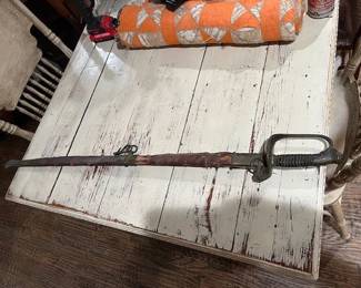 Here we have a Union Civil War Sword in a leather scabbard.