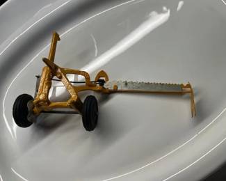 Vintage toy implement
