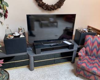 Big screen tv and 80s stand