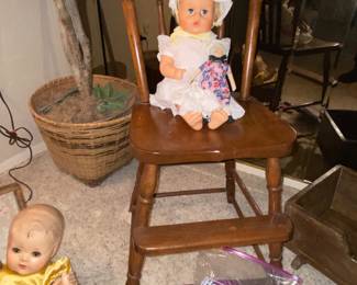 Baby dolls and wood high chair