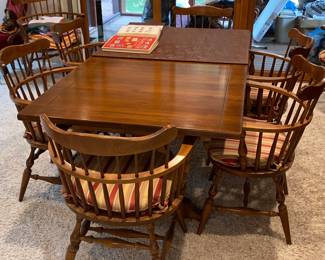 Early American style dining set -like new condition -table with 8 arm chairs and leaf /pads
