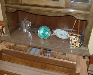 unique cabinet, the bottom half stores a pull out table with leaves for additional serving or seating, Made in the USA by Saginaw