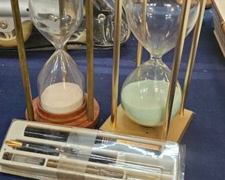 TWO HOUR GLASSES AND CALLIGRAPHY PEN