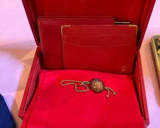 Rolex red leather billfold and card case.