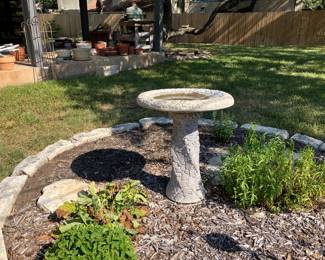 Pretty concrete bird bath. 