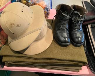 WWII hats, blankets and shoes. 