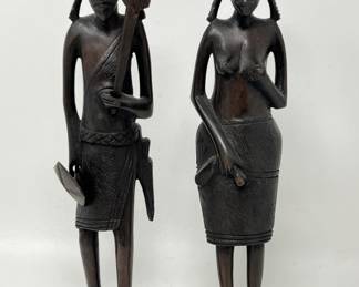 Lot 81 | Carved African Warrior Man & Woman Statues
