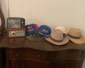 Antique dresser, vintage radios, misc hats