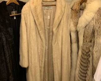 Dark brown Mink $400, White Mink $400, far right $400