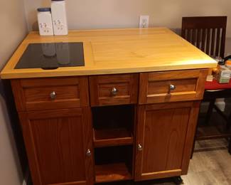 Kitchen island with drop leaf.