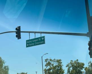 TURN RIGHT HERE! You will see a shopping center with STARBUCKS on your left...