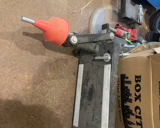 This is a motorcycle lift that connects to your pick-up truck receiver. It will lift your bike to the elevation of your truck bed with a hydraulic lift.