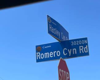 TURN RIGHT ON ROMERO CYN. ROAD AND LOOK FOR YELLOW SIGNS & ARROWS.