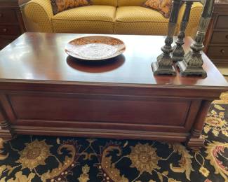 Coffee table with drawer on each end by Thomasville, pillar candle holders and decor