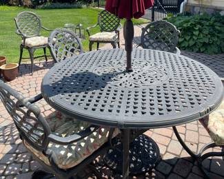 48" round patio table with 4 rocker chairs, umbrella stand and umbrella