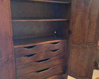 Inside storage of the Ethan Allen Wardrobe cabinet
