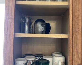 Lot 122 | Cabinet of Cups Mugs