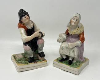 Lot 6 | Repaired Porcelain Figural Bookends Man Woman