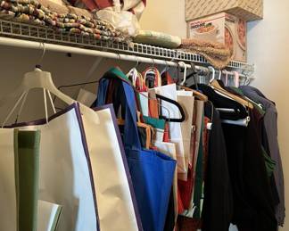 Lot 87 | Closet Contents Ladies Vests Jackets Rugs