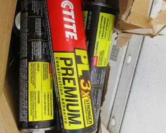 Box of Loctite Premium Construction Adhesive and Caulk Guns