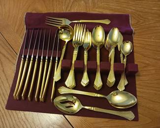 Gold tone flatware set
