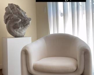 Stone sculpture is by Eric Johnson a Canadian born artist moved and opened an art center in Redstone Colorado known for igniting the art culture in the area. He commonly created these sculptures inspired by nature which stand in public parks today.