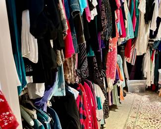 Many new with tags tops, skirts,pants, and shoes