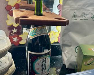 NO the alcohol is just for display , cute wooden wine glass holder for wine bottles