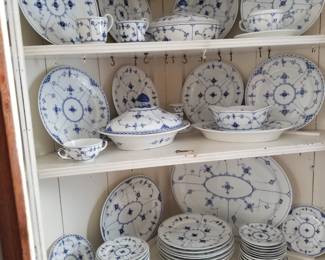 Antique oak corner cabinet filled with many Rare pieces of Royal Copenhagen. 