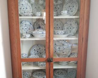 Unusual and Rare East Tennessee oak corner cupboard with sawtooth molding.
