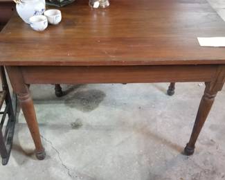GARAGE,  early walnut farm table.
