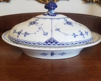 Another covered serving dish.