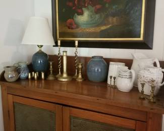 Large walnut pie safe, framed poppies oil, antique pitchers.