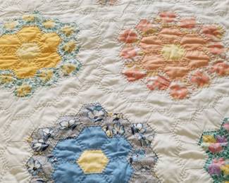 Grandma's flower garden quilt.