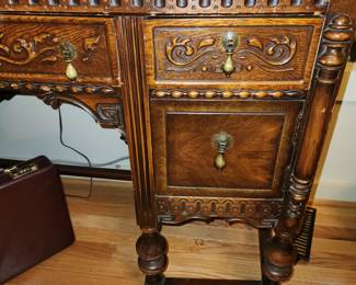 Bedroom #2: Carved antique bedroom set (headboard, dresser w mirror, tall dresser, desk/vanity w bench, 2 night stands and 1 wall mirror)